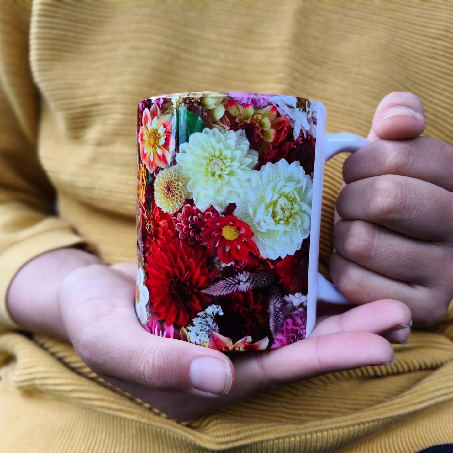 A colourful mug flly wrapped in unique dahlias of all kinds by Gracie-Mae Photography.