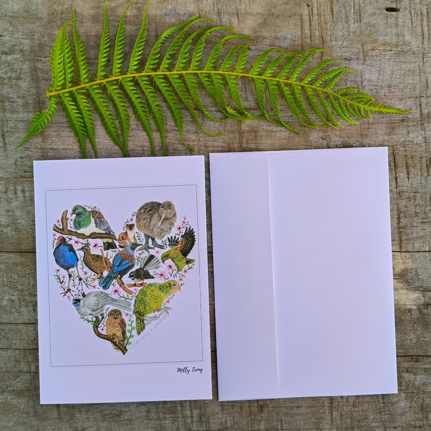Hand-drawn NZ bird heart greeting card by Milly – blank inside
