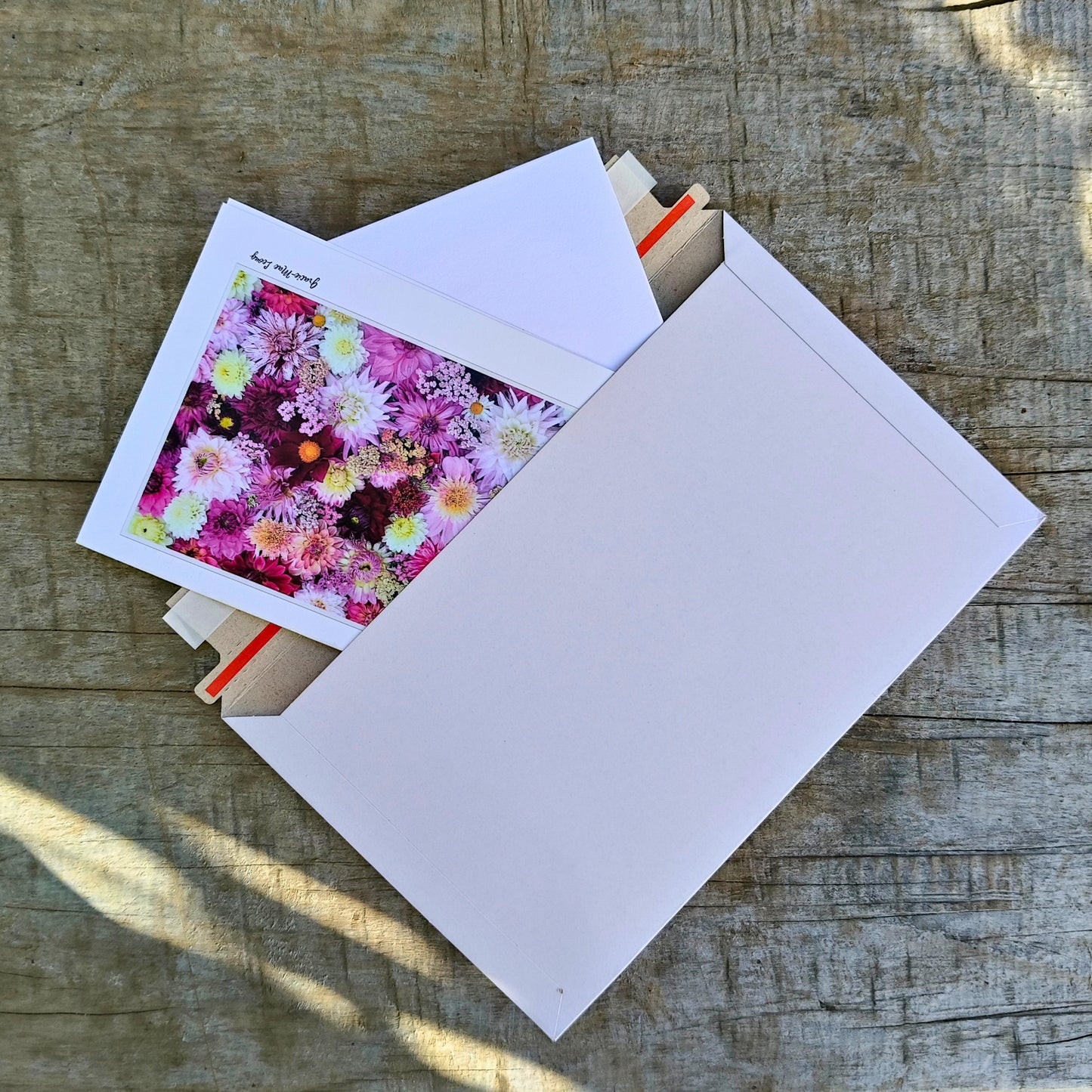 Greeting card featuring purple dahlia flatlay by Gracie-Mae – blank inside