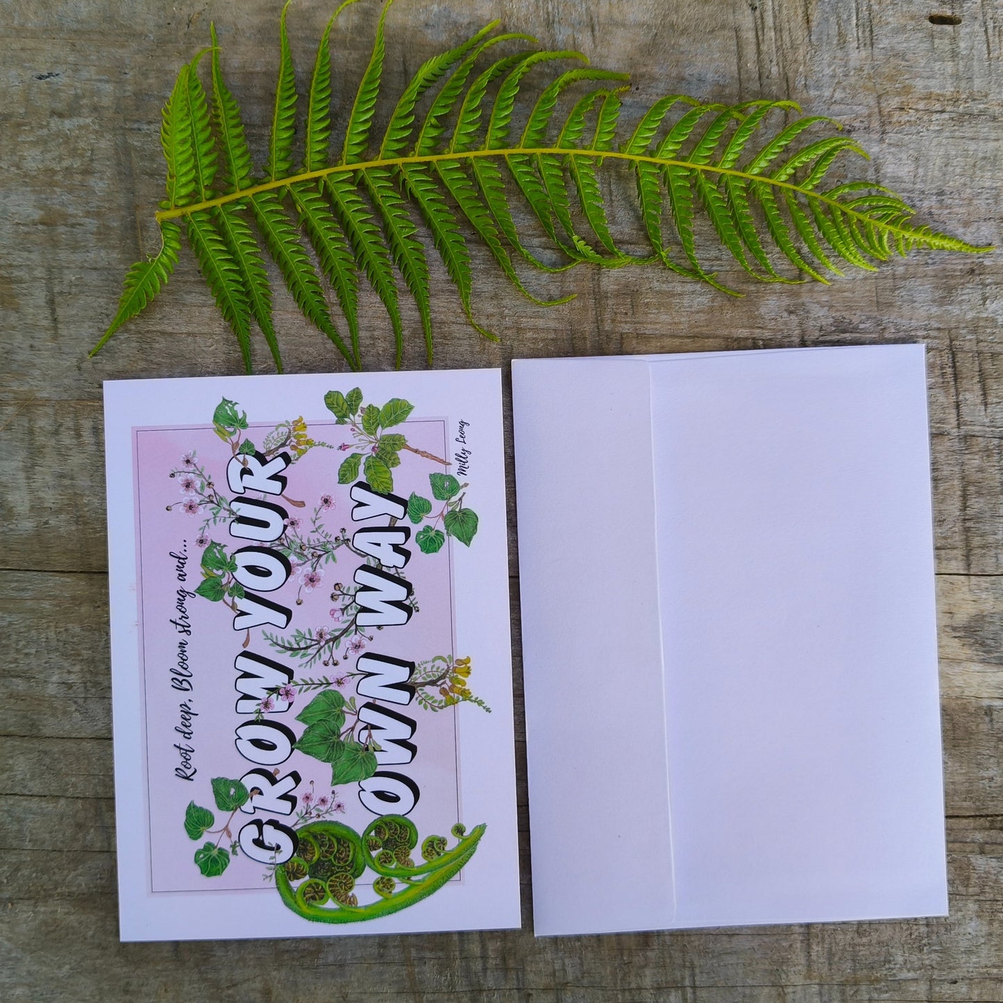 Grow Your Own Way saying with hand drawn NZ native leaves by Milly.