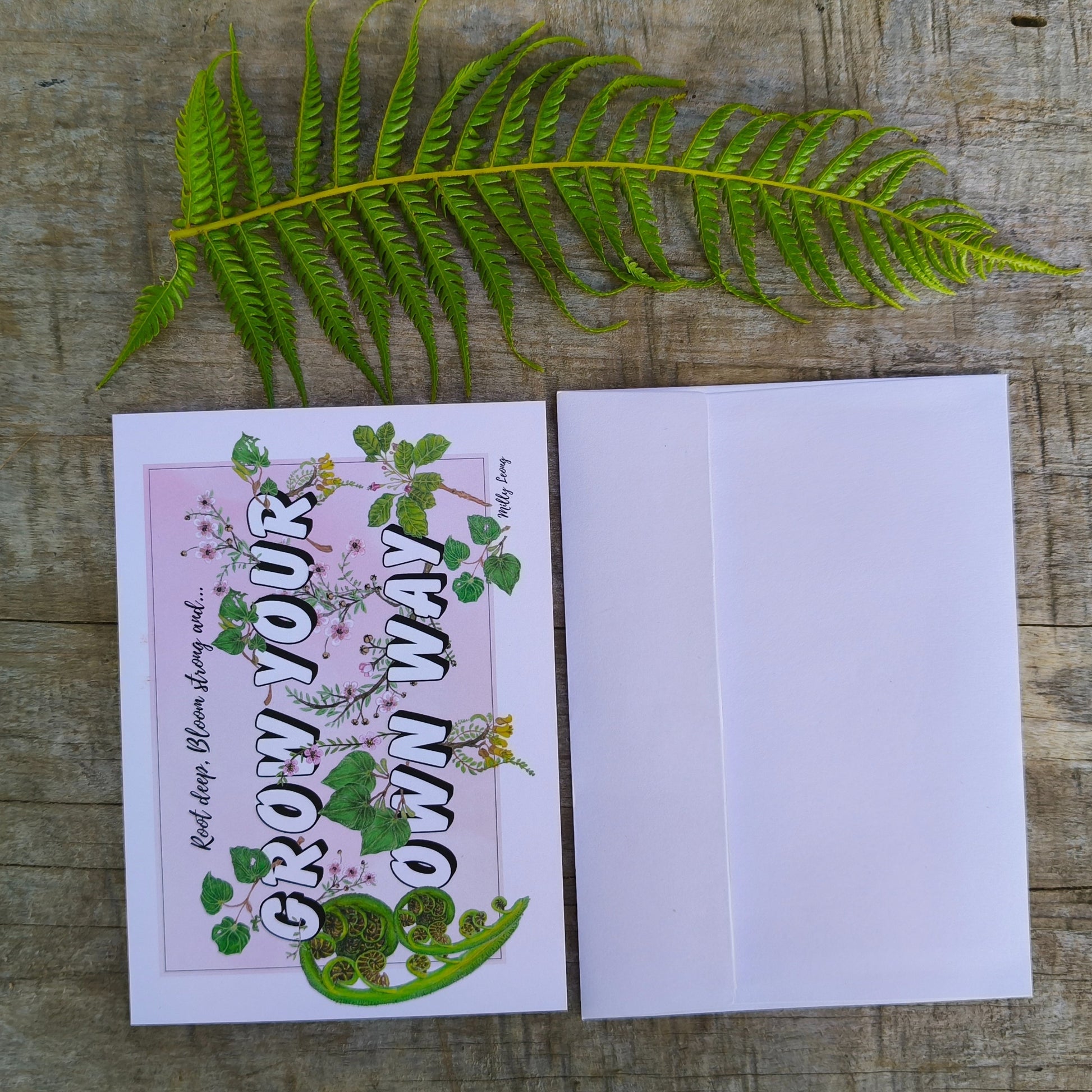 Grow Your Own Way saying with hand drawn NZ native leaves by Milly.