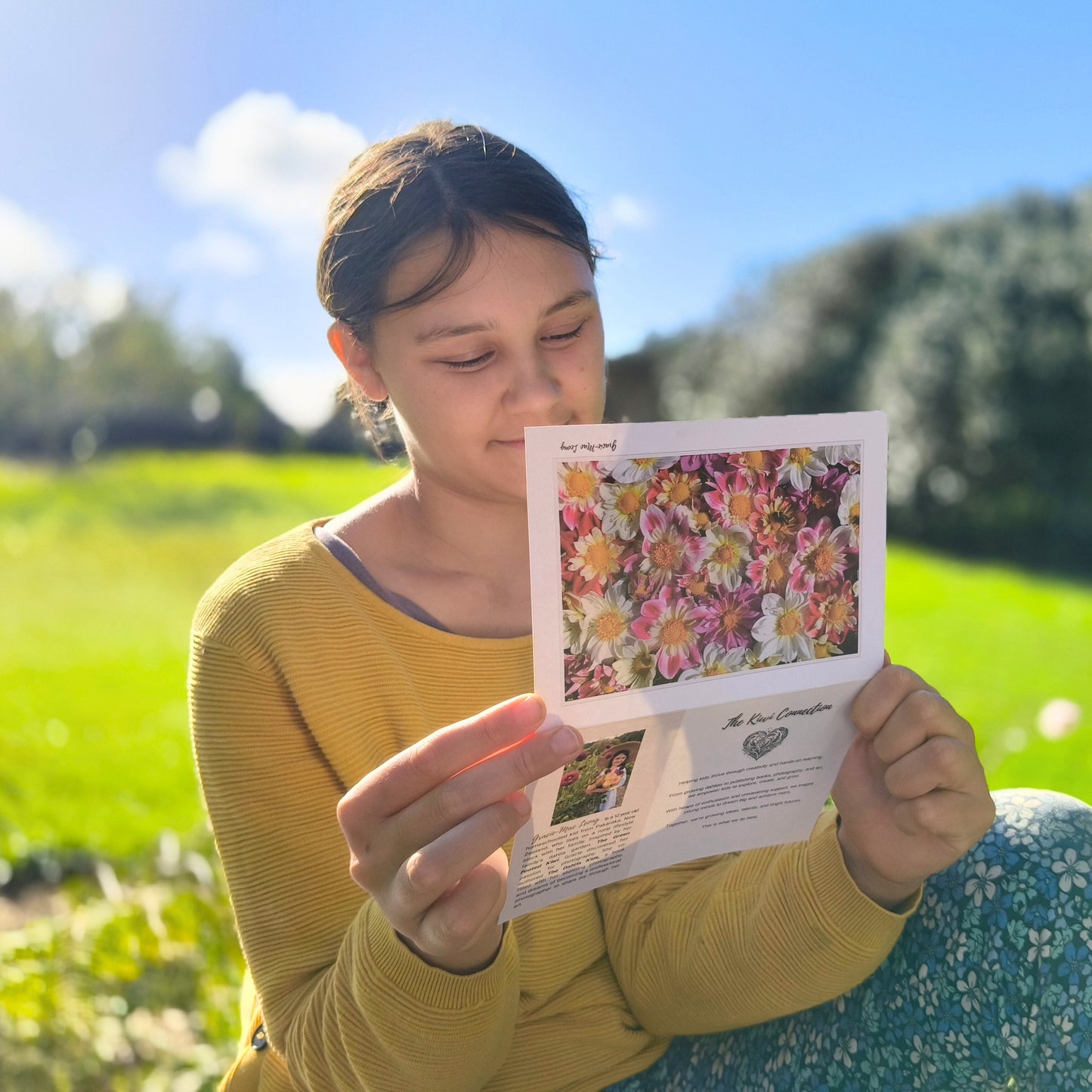 Greeting card featuring collarette dahlia flatlay by Gracie-Mae – blank inside