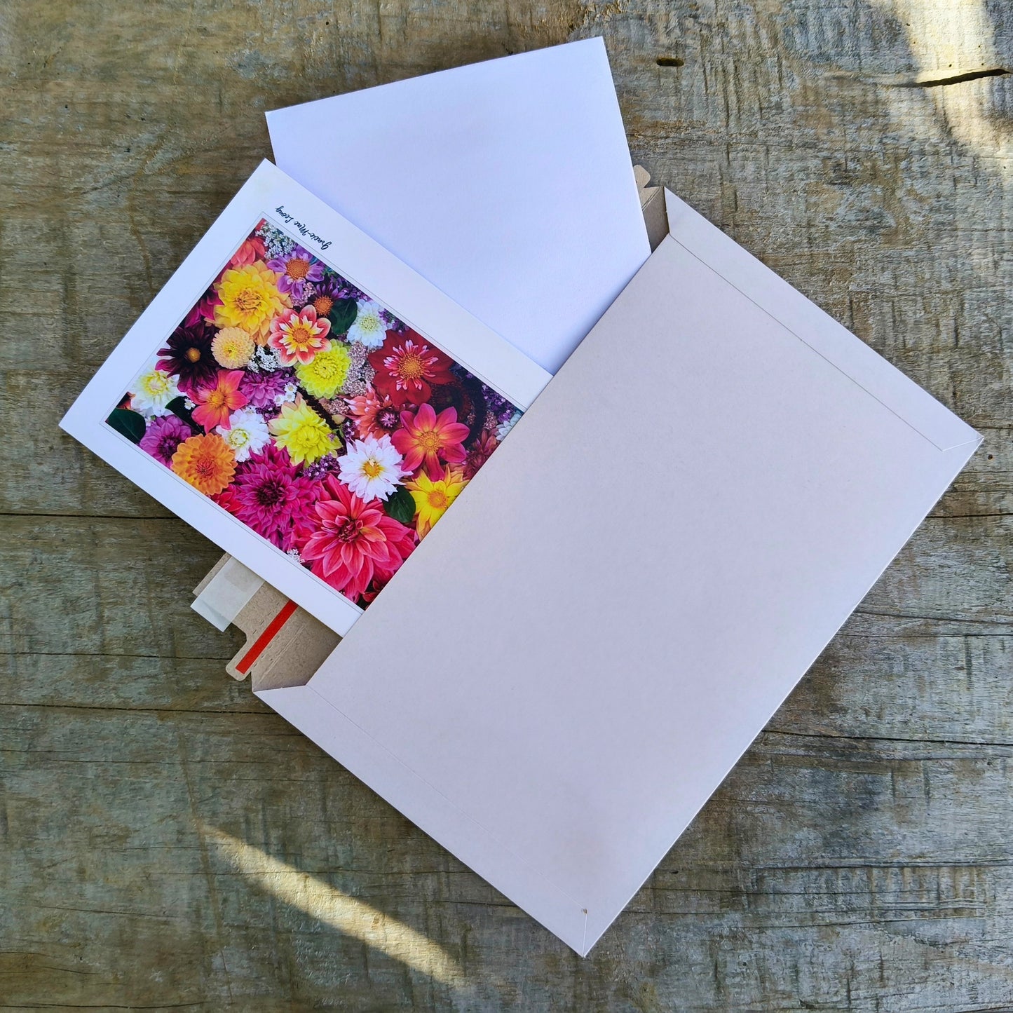 Greeting card featuring dazzling dahlia flatlay by Gracie-Mae – blank inside