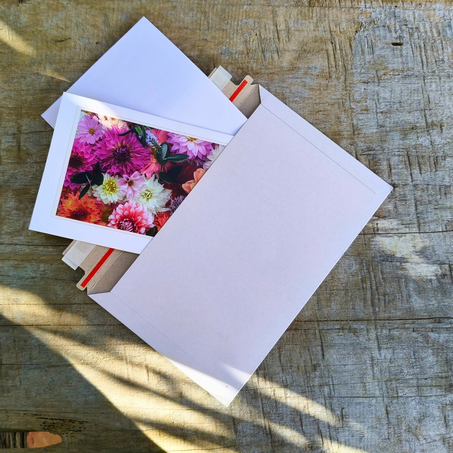 Greeting card featuring big pink dahlia flatlay by Gracie-Mae – blank inside