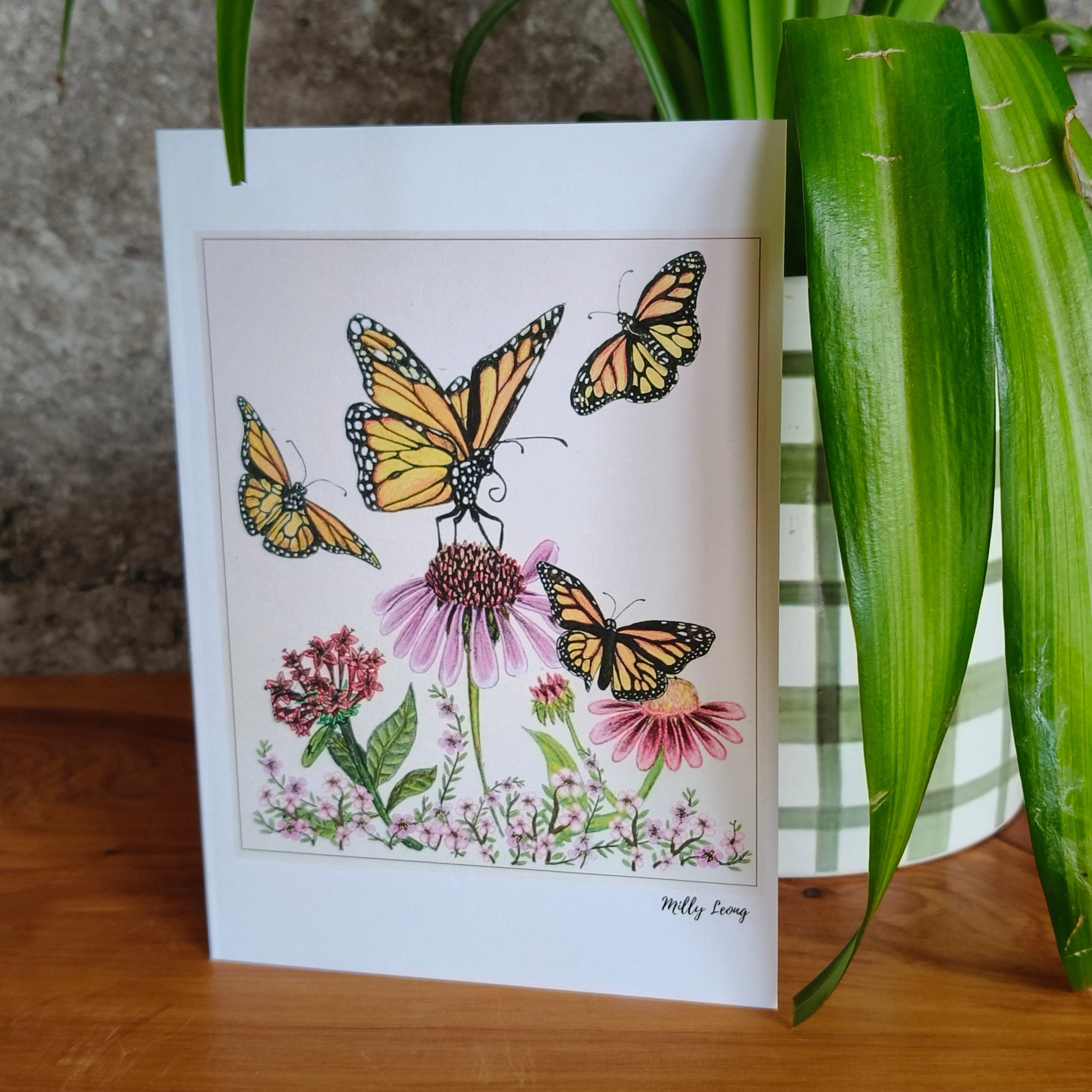 Hand-drawn three butterflies and flower greeting card by Milly – blank inside