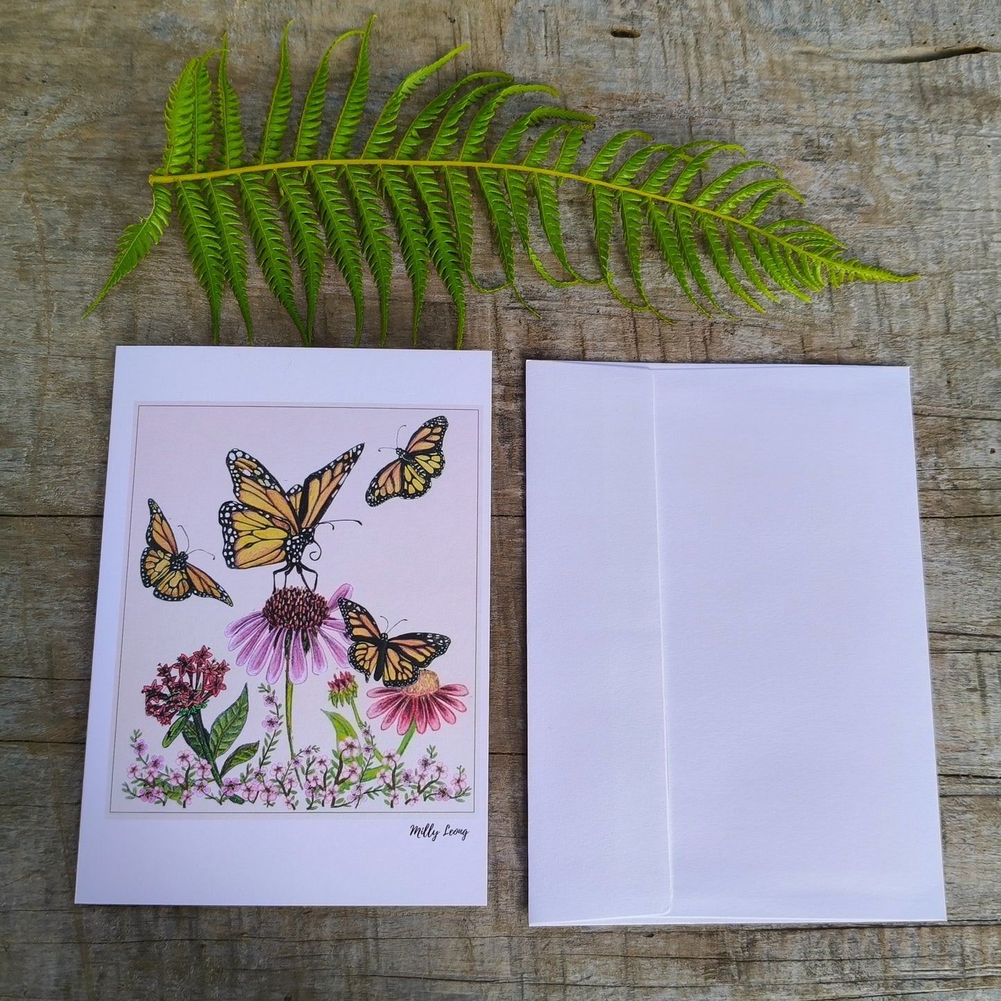 Hand-drawn three butterflies and flower greeting card by Milly – blank inside